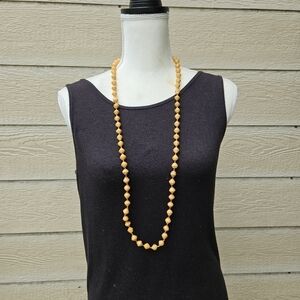 Bead for Life orange paper bead necklace made in Uganda